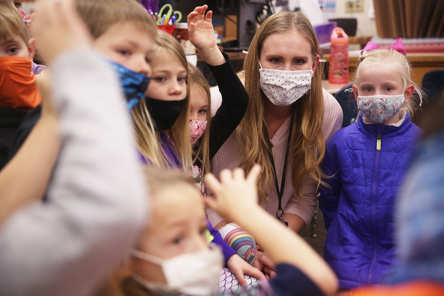 Nicole Asay listens with her group of students